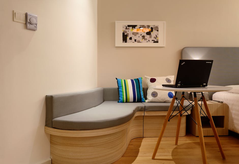 apartment interior with laptop on table
