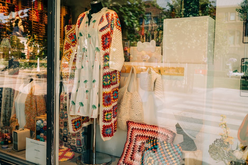 artisan crochet dresses displayed in boutique window