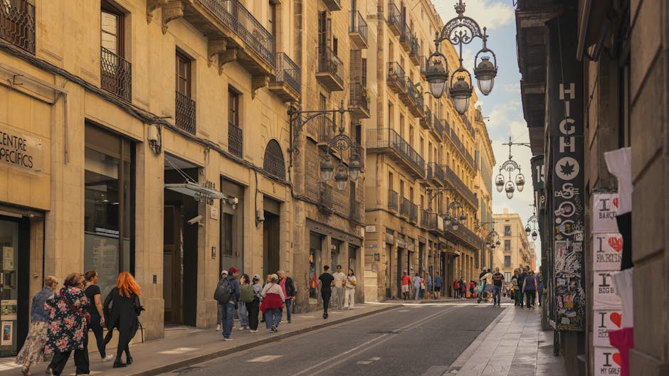 Barcelona street with small local shop and entrepreneurs