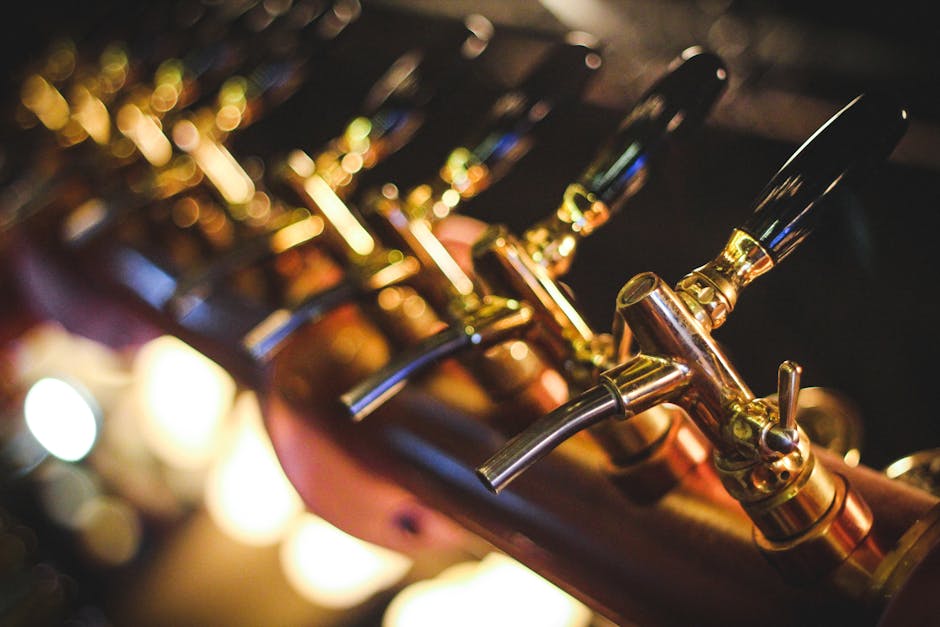 beer taps at german brewery with brass handles