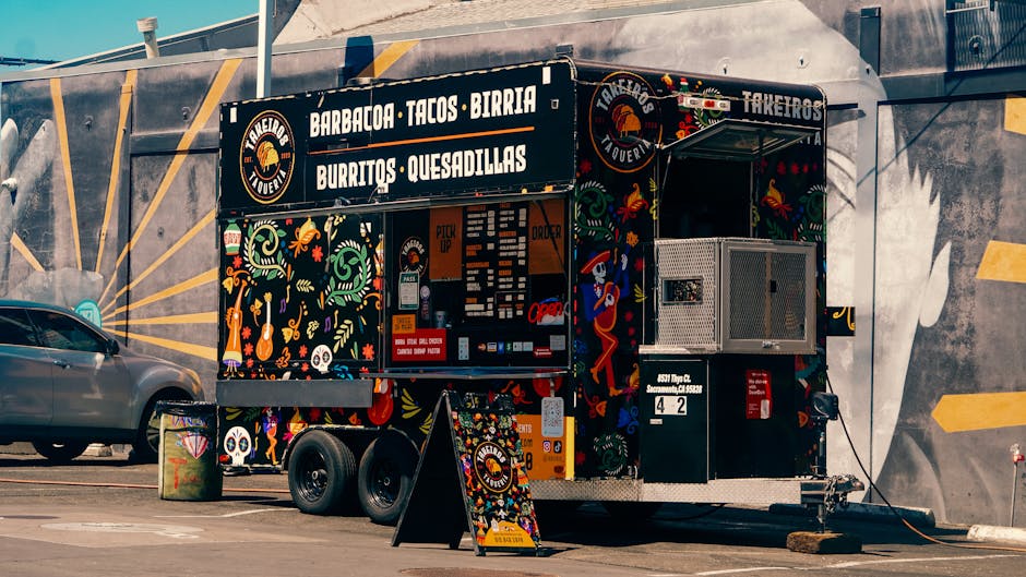 Birria tacos on parchment paper in food truck