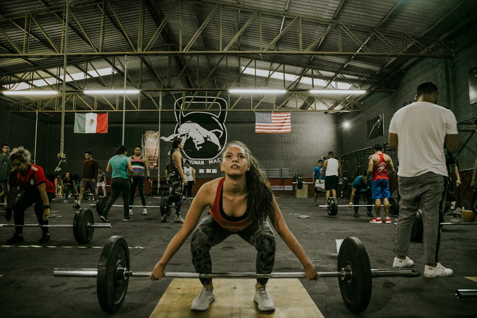 Brazilian gym goers lifting weights