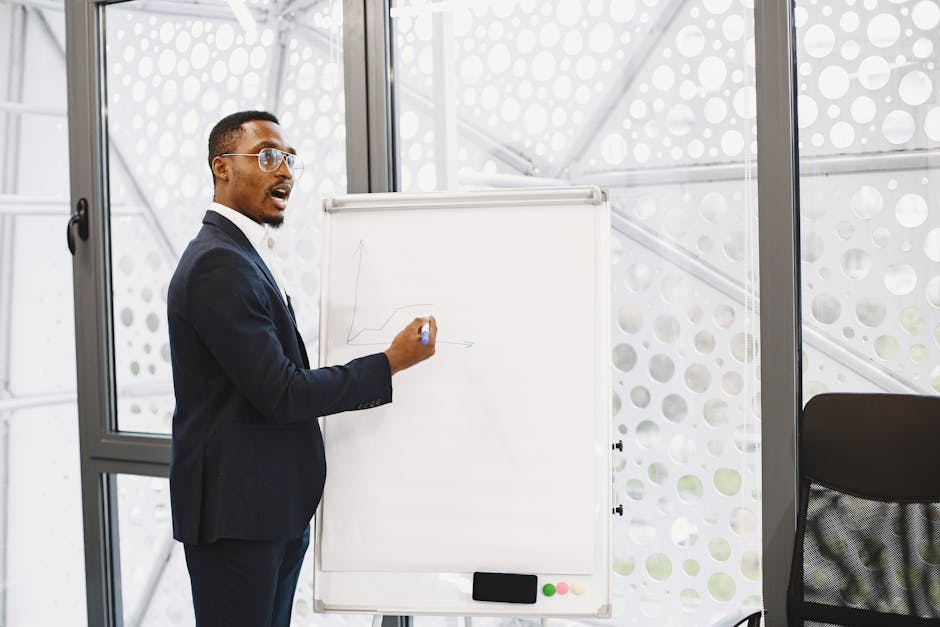 business chart analysis on glass wall in conference room