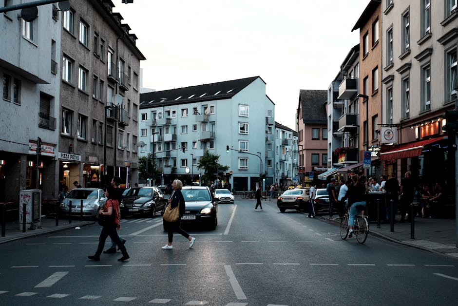 busy pedestrian street in germany at dusk
