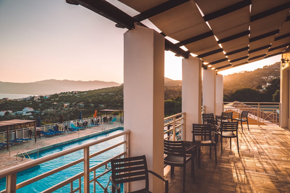 coastal hotel terrace overlooking the sea at sunset