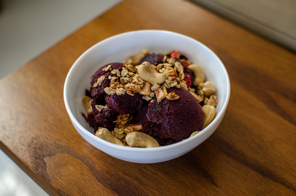 Colorful açaí bowl with granola and fruits at Brazilian fair