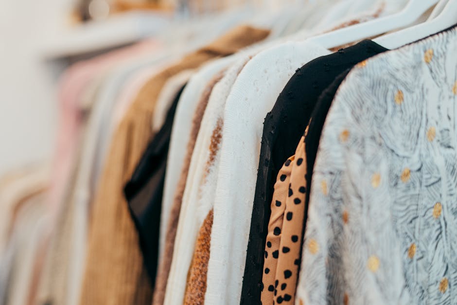 Curated clothing rack with vintage dresses at boutique