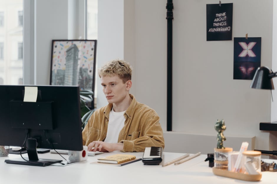 design professional creating wireframes on computer