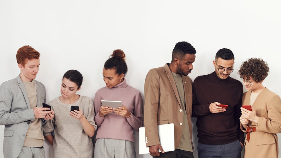 diverse group of Brazilians paying with mobile phone