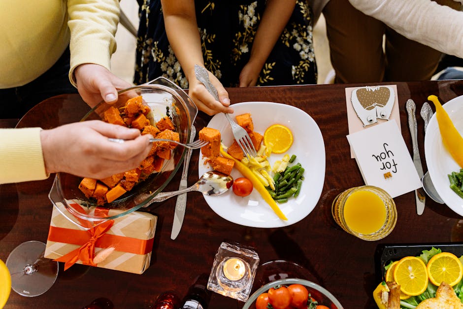 family eating healthy food from air fryer at dinner table
