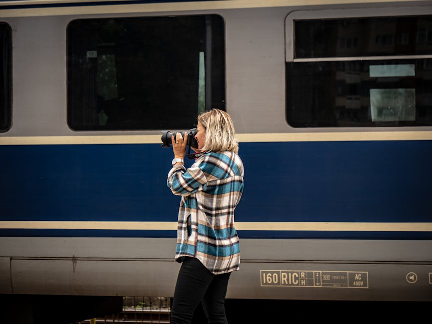 female traveler taking photo in Barcelona street