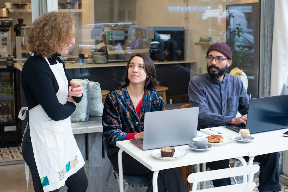 freelancer meeting client at Spanish cafe