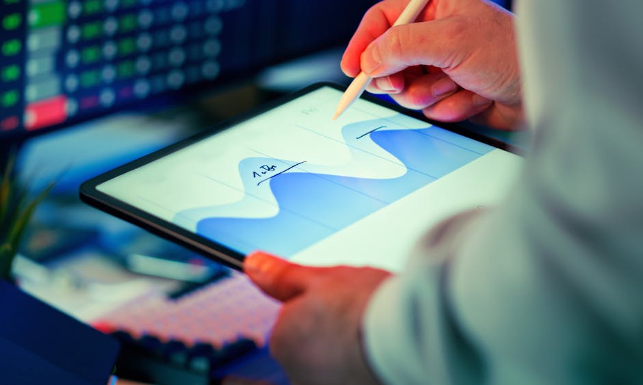 French entrepreneur reviewing analytics dashboard on tablet