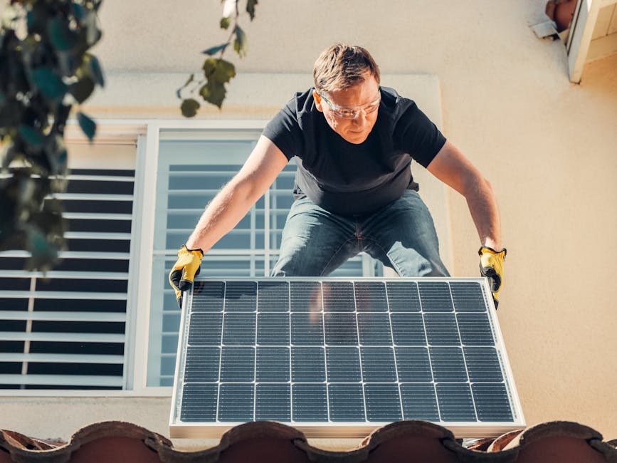 french family installing solar panels on roof
