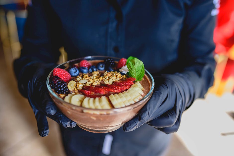 fresh acai smoothie bowl with granola and banana slices