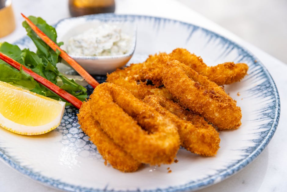 fresh fried calamari rings with garlic sauce in Barcelona