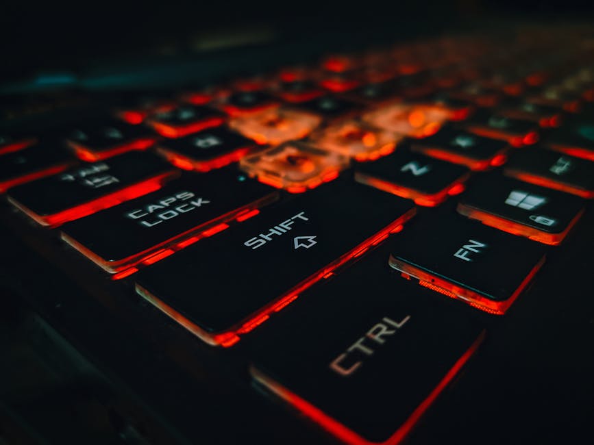 gaming keyboard with neon RGB colors in dark room