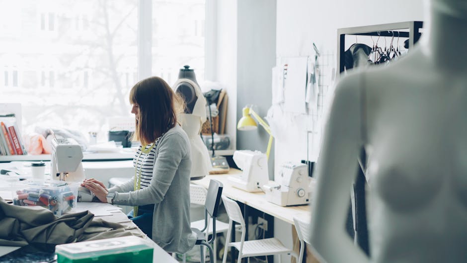 german tailor sewing sustainable fashion in sunny atelier