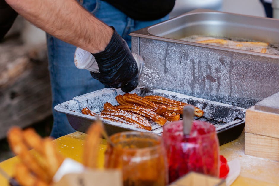 hands preparing traditional Spanish dessert