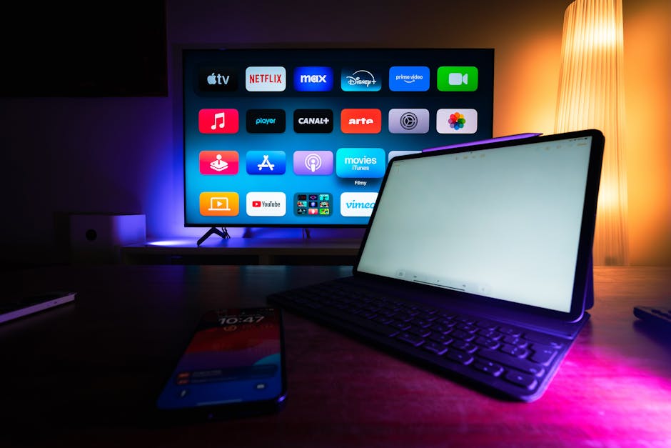 large TV screen with colorful streaming interface in dark room