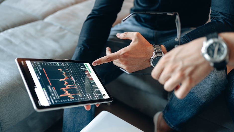 person analyzing social media metrics on tablet screen