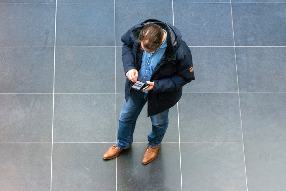 person checking shoe prices on phone