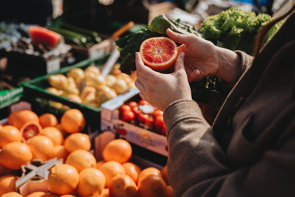 person  fresh produce at market