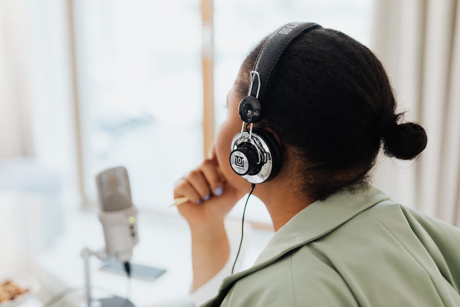 person listening to podcast headphones