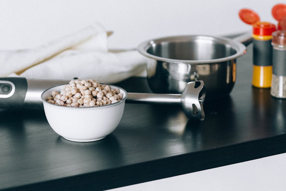person preparing hummus in kitchen