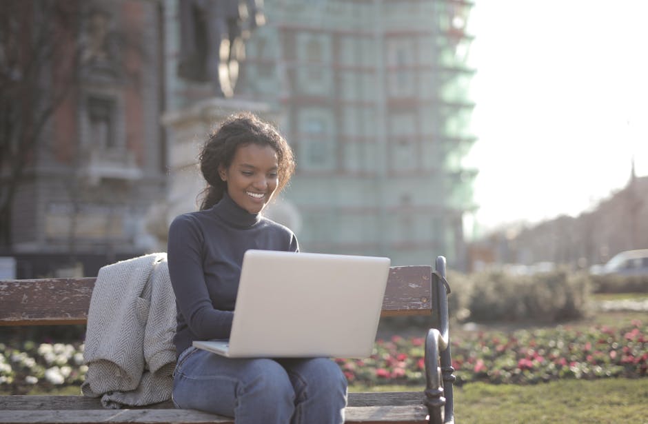 person working on laptop german city