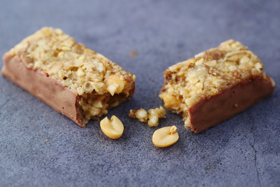 protein bars and healthy snacks arranged on table