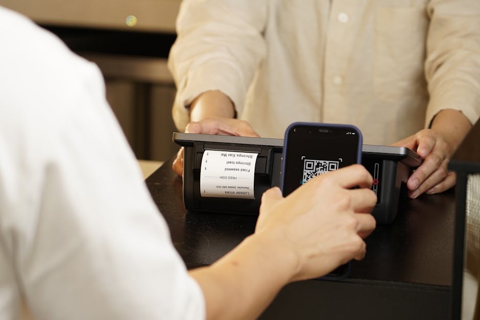 QR code payment being scanned at a Brazilian market stall