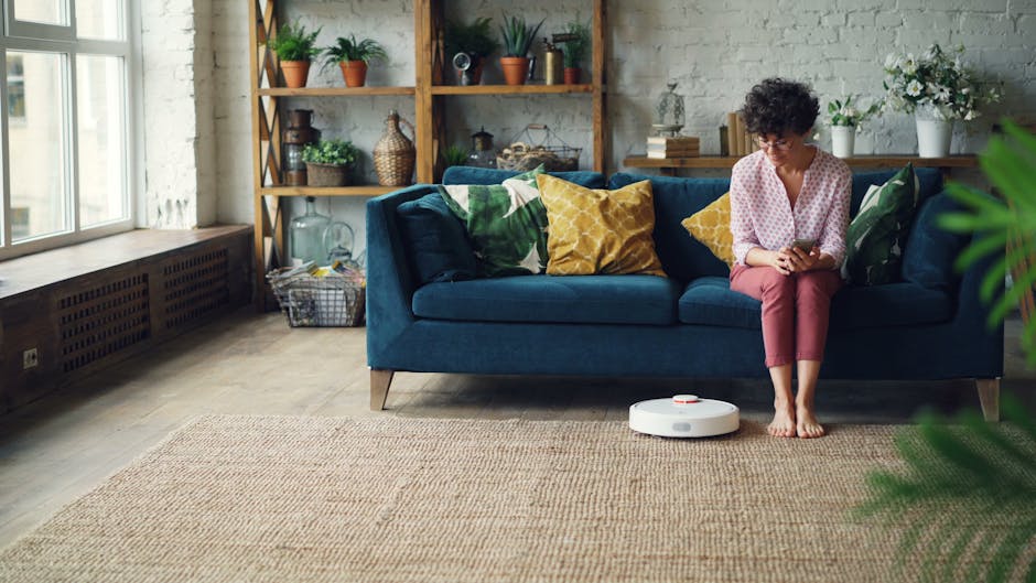 robot vacuum navigating around furniture in living room