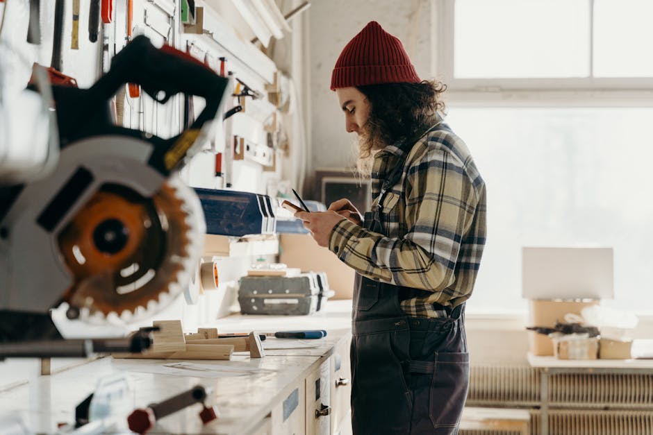 small business owner checking smartphone  dashboard