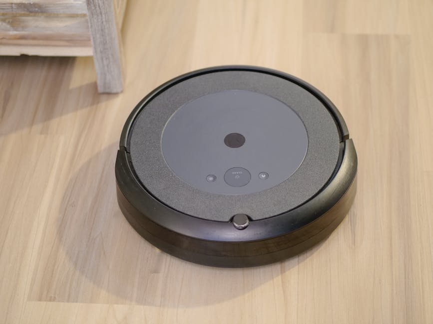 smart robot vacuum navigating around furniture in apartment