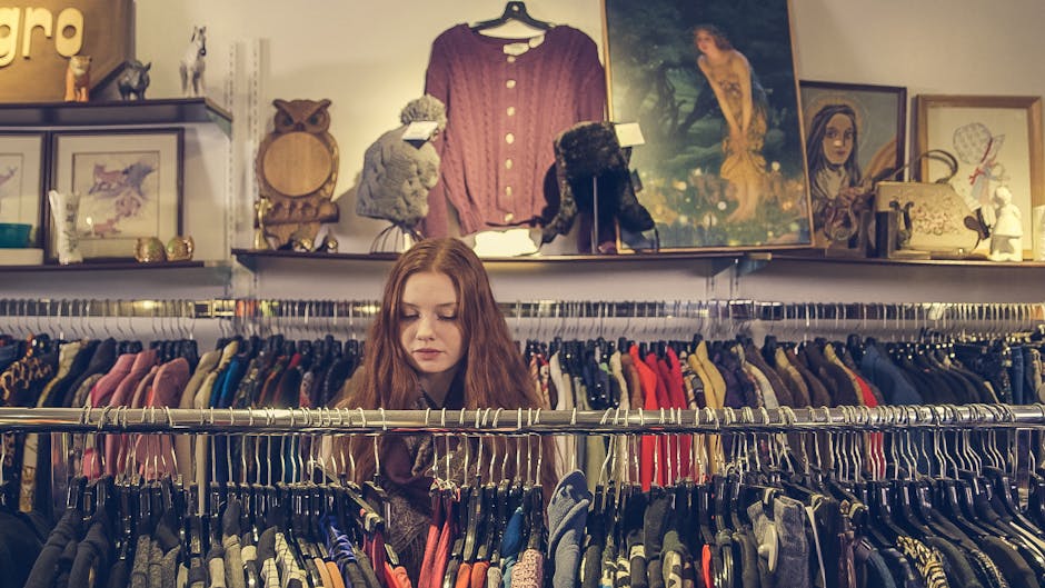 thrift store rack with colorful vintage clothing