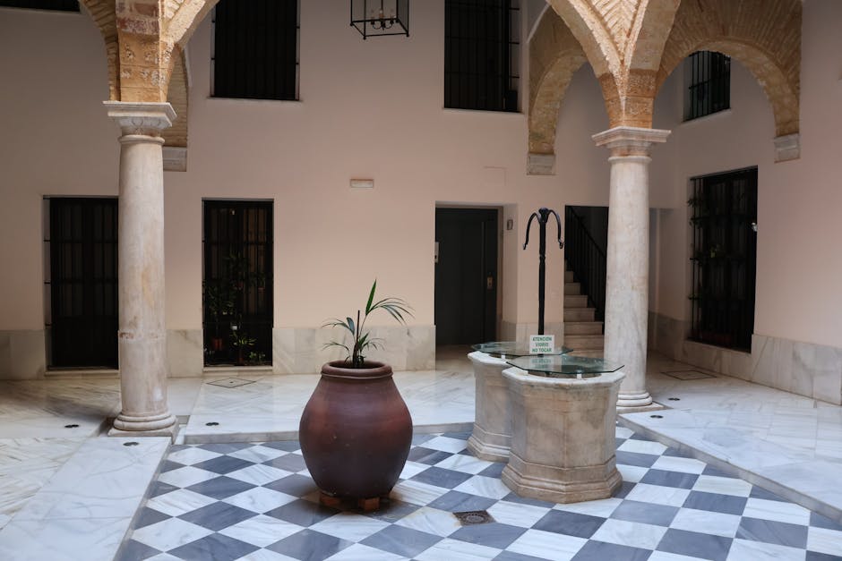 traditional Spanish courtyard with orange trees