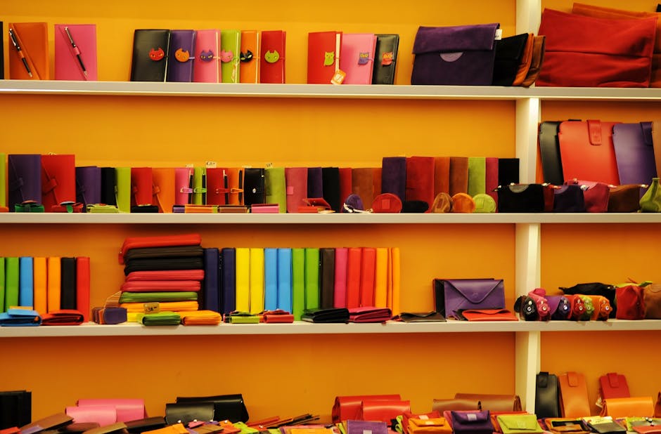 variety of colorful smartwatches displayed on shelf