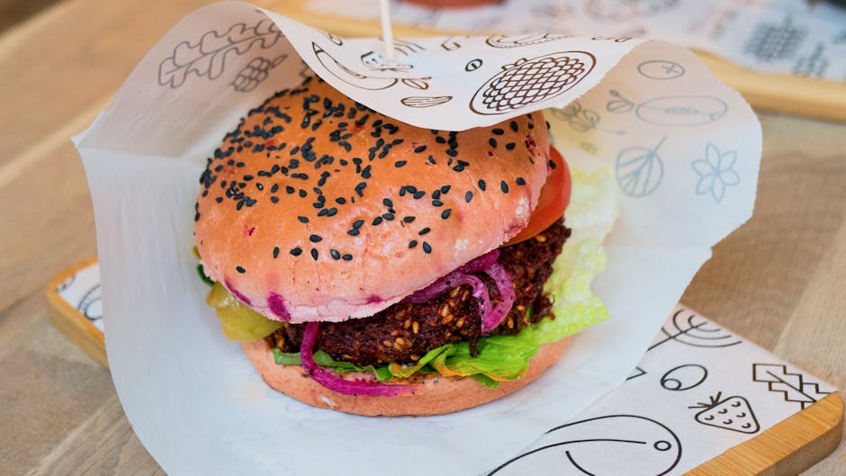 vegan burger with fresh vegetables on a wooden table in brazil