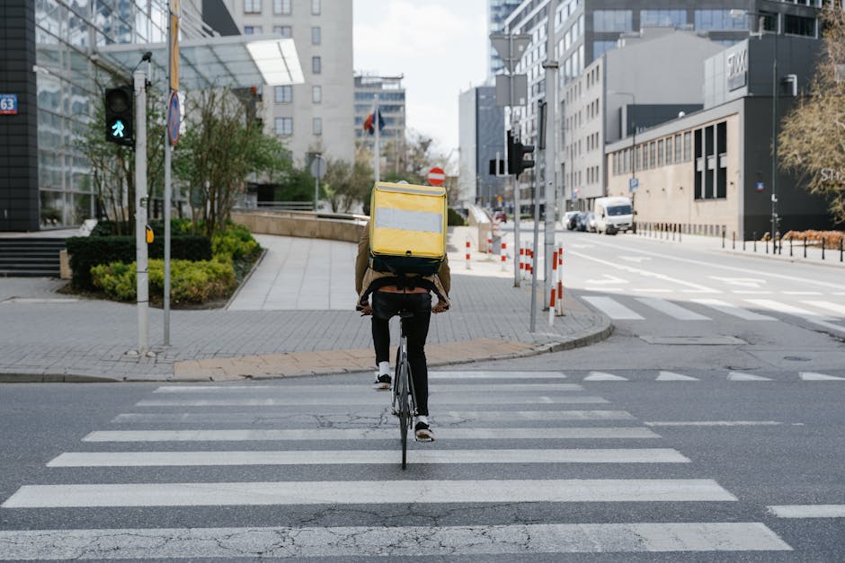 woman delivering food on bicycle city street