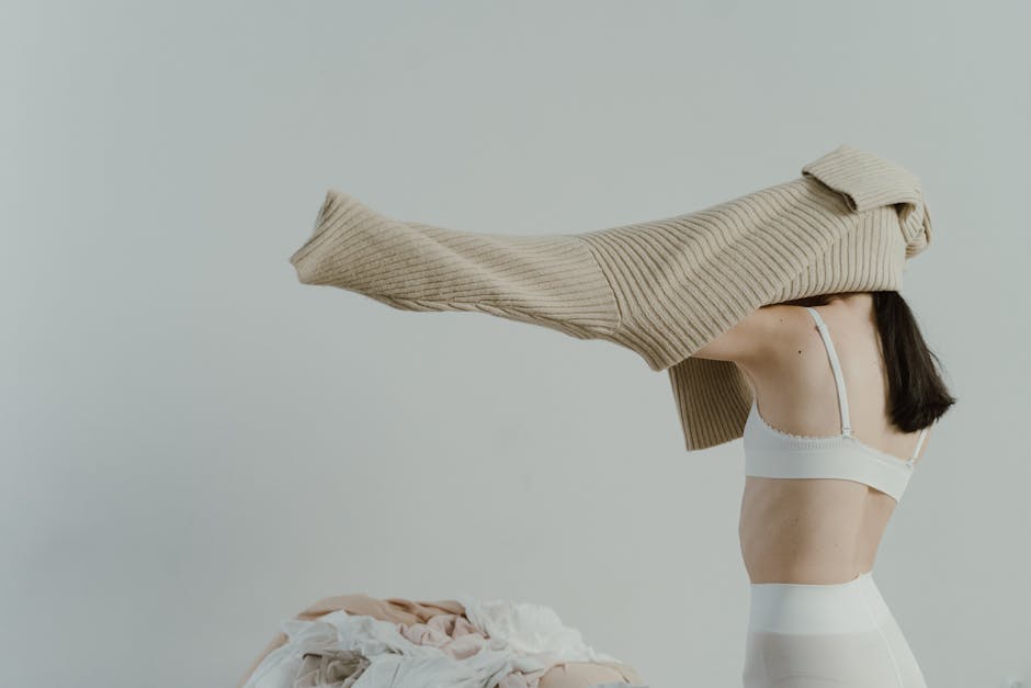 woman in elegant beige sweater