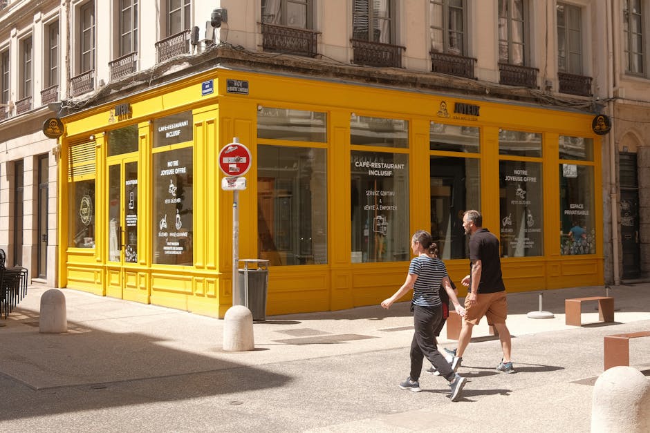 young professional writing content at cafe in Lyon France