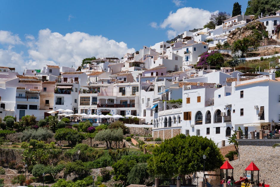 young travelers exploring traditional village in Spain