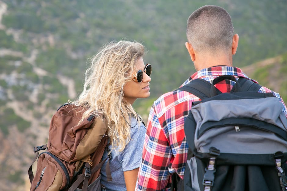 young woman with backpack at Polish mountain hiking trail